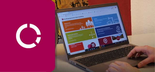 Hände bedienen einen Laptop auf dem das Dashboard des Bürgerportals angezeigt wird