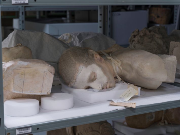 A man from North Africa #884 (by Ben Ripley) the bust of a North African man lies on the shelf of a museum archive