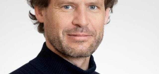 Man sieht das Portraitbild von Wolfram Pernice.