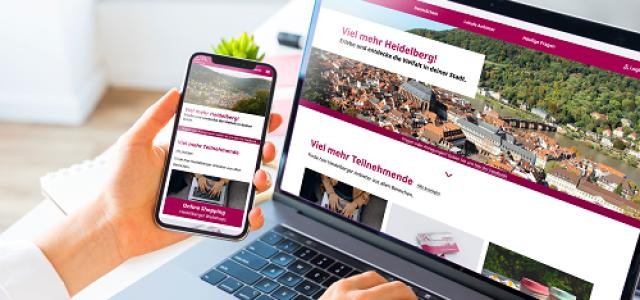 Die überarbeitete Seite vielmehr.heidelberg.de wird auf einem Laptopbildschirm und einem Handy angezeigt.