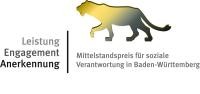 Ein Löwe auf weißem Hintergrund sowie die Wörter Leistung, Engagement und Anerkennung sowie "Mittelstandspreis für soziale Verantwortung in Baden-Württemberg".