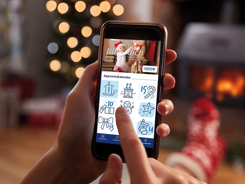 Im Advent wartet jeden Tag ein Gewinnspiel mit tollen Preisen in der Stadtwerke Heidelberg-App »für dich«. (Foto: Stadtwerke Heidelberg) für dich App ist auf einem Smartphone geöffnet
